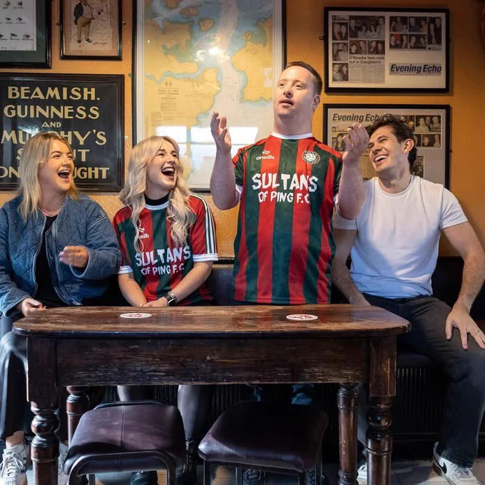 Four people with the Forsa Sultans shirt