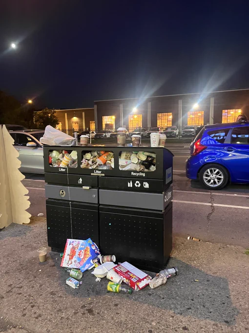 An overflowing trash can in Brad Bradford's riding