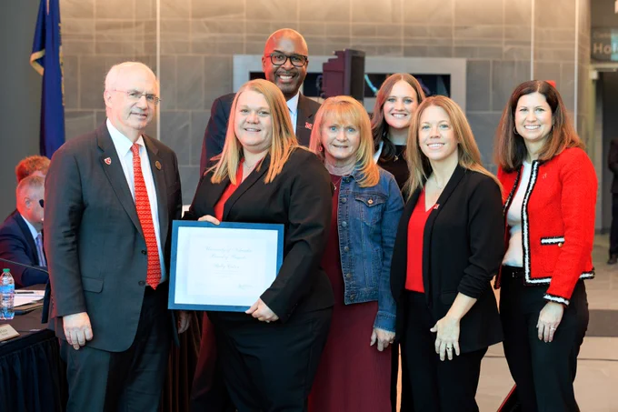 Shelly Cutsor receiving a KUDOS from the Board of Regents