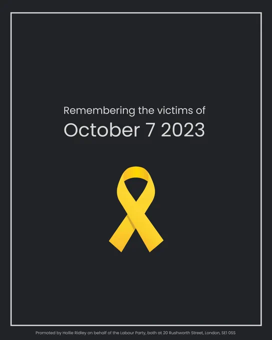 Graphic with dark background and white text that reads: “Remembering the victims of October 7 2023”. Beneath the text is a yellow ribbon.