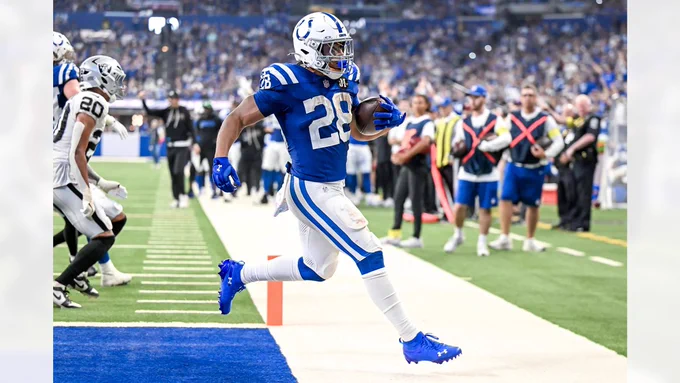 Indianapolis Colts RB #28 Jonathan Taylor scores a touchdown during a Week Five game against the Las Vegas Raiders 