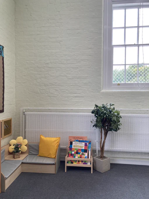 a reading space in one of the bright classrooms at The Meadow