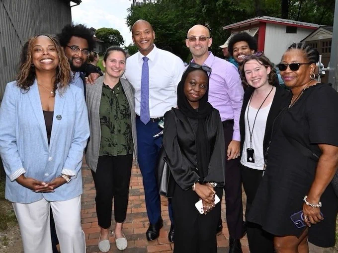 Governor Wes Moore (center), Dani Schulman MPP 2026 (third from left) and the Maryland Department of the Environment Environmental Justice team led by Assistant Secretary Aneca Atkinson (far left) at the Environmental Justice Executive Order Signing on July 17, 2025.