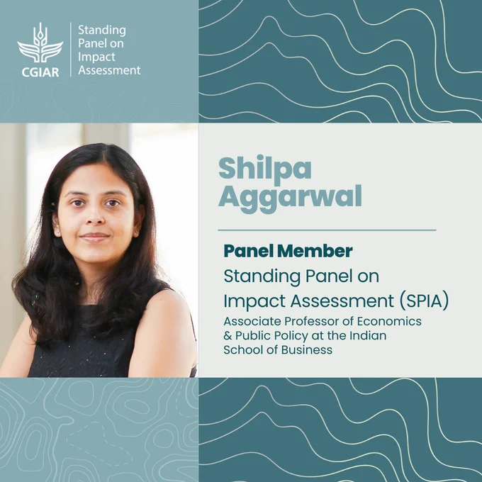 Profile image of Shilpa Aggarwal, a panel member of the Standing Panel on Impact Assessment (SPIA) and Associate Professor of Economics & Public Policy at the Indian School of Business. The background features a blue wave pattern.