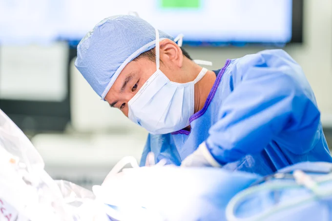 Photo of Dr. Yang in the operating room