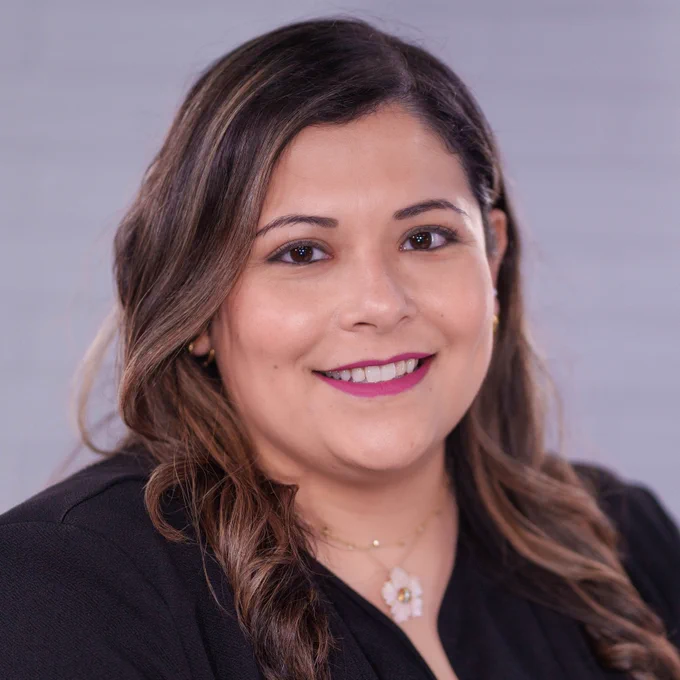 Peete Elementary’s new principal, Anais Favela Jaimes, smiles on the Talks With Tyler ISD podcast set.