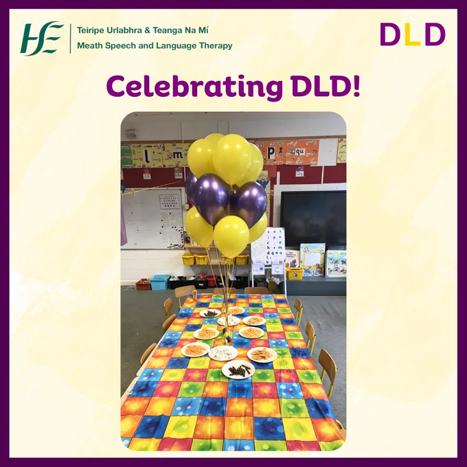 Title: Celebrating DLD!

Image: Table covered in coloured tablecloth. Snacks on plates on table. Purple and yellow balloons in the middle of the table.