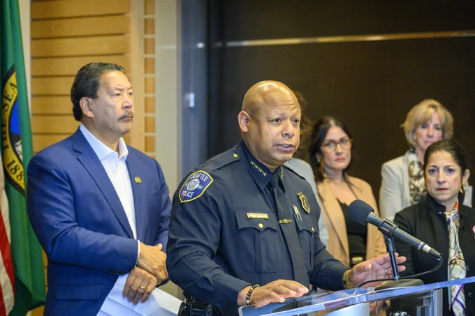 Chief Shon Barnes speaking at a press conference 