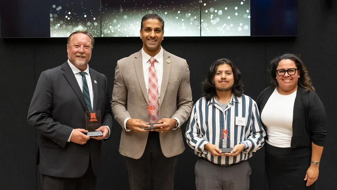 Matthew Gottschall, Harnoor Dhaliwal, Osvaldo Palma Vargas, and EDAD Interim Chair Elvira Abrica pose for a group photo after the EDAD Impact and Inspiration Awards