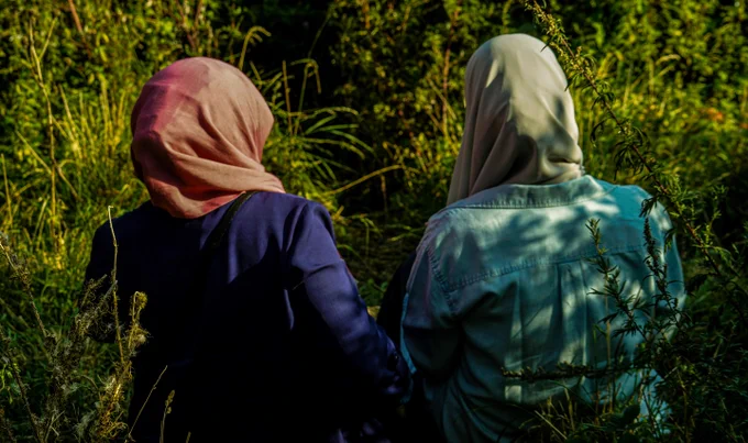 Two women wearing headscarves