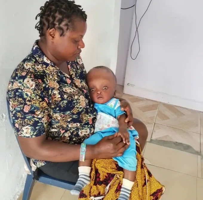 Blessing and her daughter