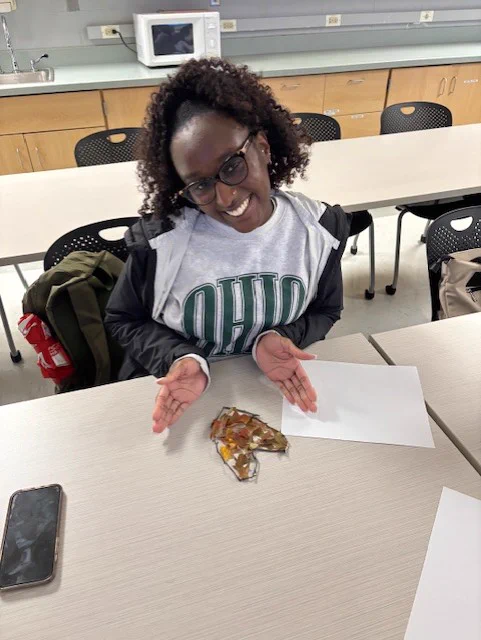 OTD student, Arianna Story, posing with her nature based activity