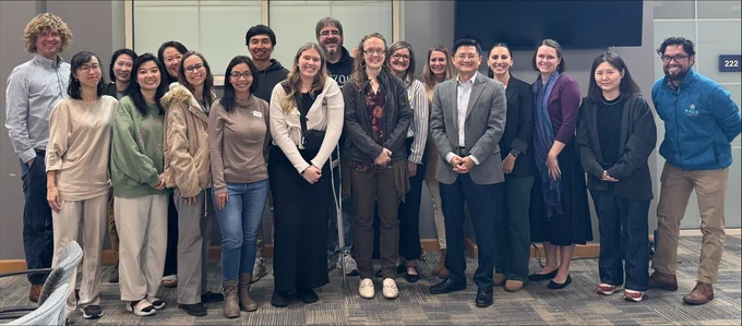 A group photo of Dean Xie with junior faculty.