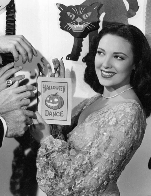 Linda Darnell going to the Halloween dance.
