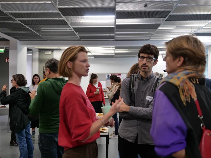 Participants of the summit discussing things during a break
