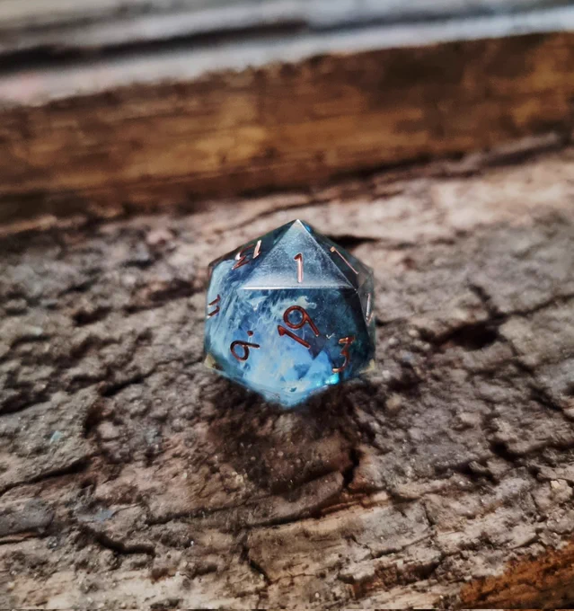 Photo of custom dice on wood 1/3