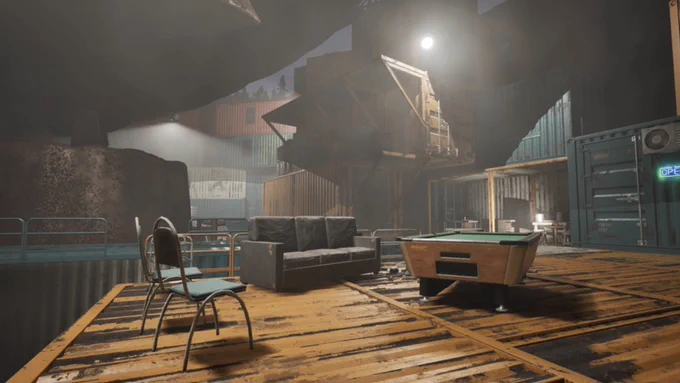 A makeshift lounge area inside a post-apocalyptic shelter in this upcoming indie game. The floor is constructed from metal shipping containers. A worn pool table, a black leather sofa, and a couple of mismatched chairs sit under a bright spotlight. A glowing neon “OPEN” sign hangs on a teal storage container. 