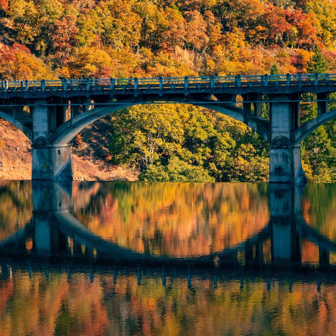This shot captures the center span of the Pit 3 bridge over the dam of the same name. It was shot from just to the north, looking across Lake Britton. The water at the top of the dam reminds me a great deal of an "infinity edge" swimming pool when the lake is full and I thought it looked wonderful reflecting fall tones in the October late afternoon light.


Lake Britton is in Shasta County, California. It is popular among anglers targeting trout, bass, and crappie. It is fed by the Pit River, Hat Creek, Burney Creek, and Clark Creek. The main body of the lake is very near The McArthur-Burney Falls Memorial State Park