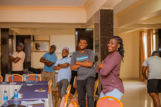 Marcella Okuku having fun with her team.