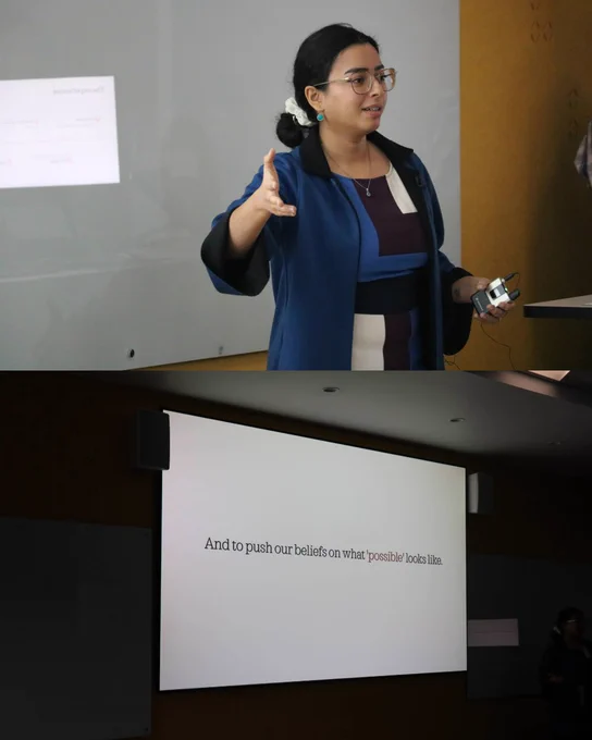 2 photos
1: A photo of a woman holding her arm towards a screen presenting

2: A photo of the screen that reads 'and to push our beliefs on what 'possible' looks like'