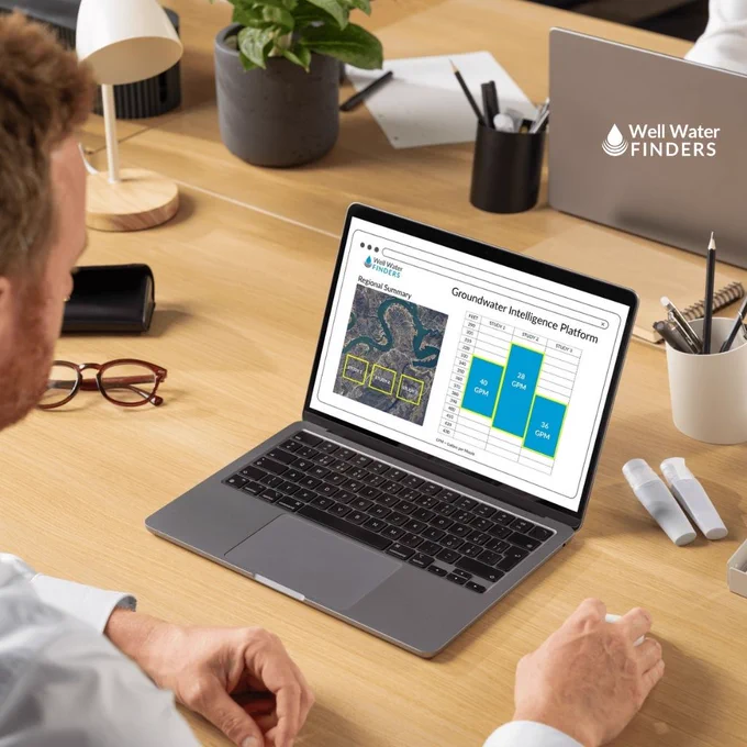 Professional viewing Well Water Finders Groundwater Intelligence Platform data on a laptop, symbolizing the company’s progress toward a global groundwater intelligence network, showcased at Austin Tech Week.