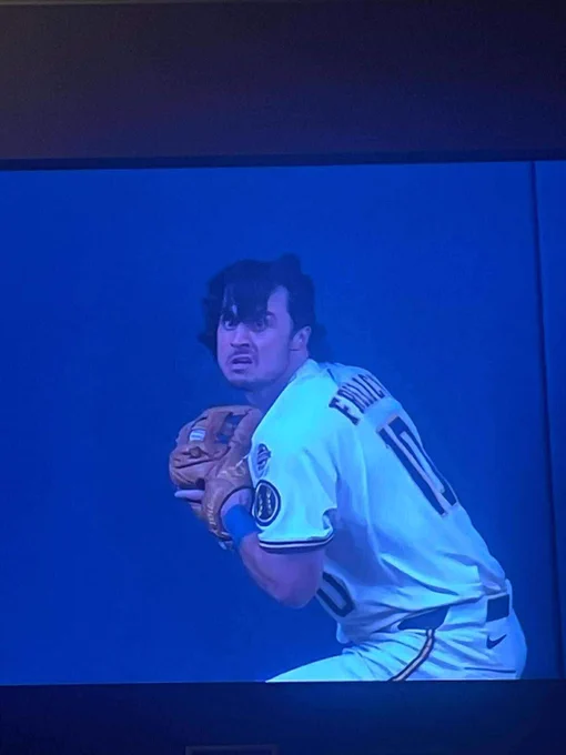 Sal Frelick of the Brewers making a play whilst sporting crazy eyes