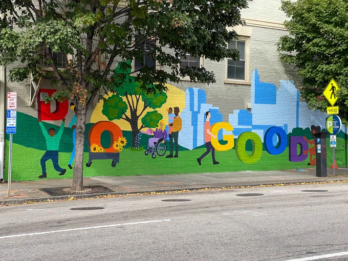 A mural in downtown Raleigh. Letters spell "do good" 