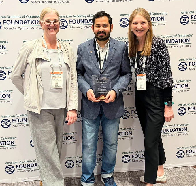 L-R - Professor Isabelle Jalbert, PhD Candidate Soumen Sadhu holding his Ezell Fellowship Award and Scientia Professor Fiona Stapleton AO