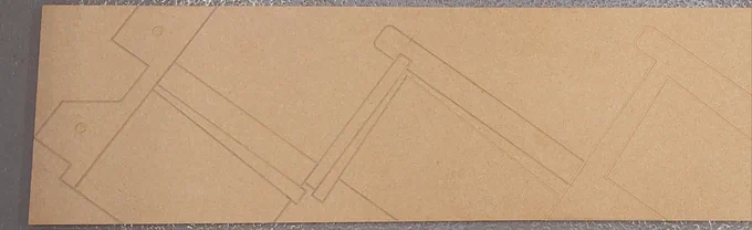 A MDF board machined out on the CNC showing what the set out for the stairs should look like. 