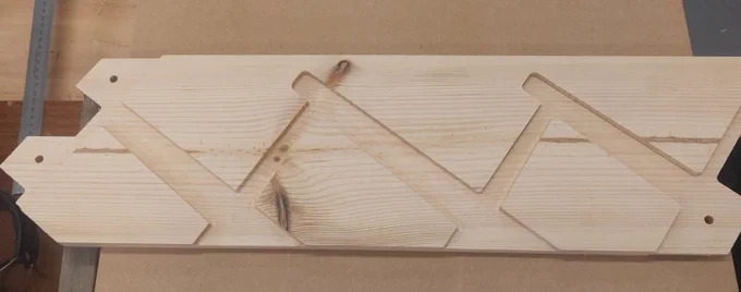 A cut string showing the housings for the tread, riser and wedges. 