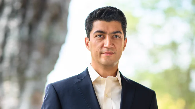 Headshot of Reza Moini