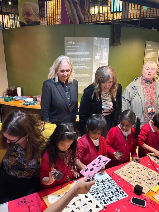 Cllrs getting involved witht the children's arts and crafts activities.