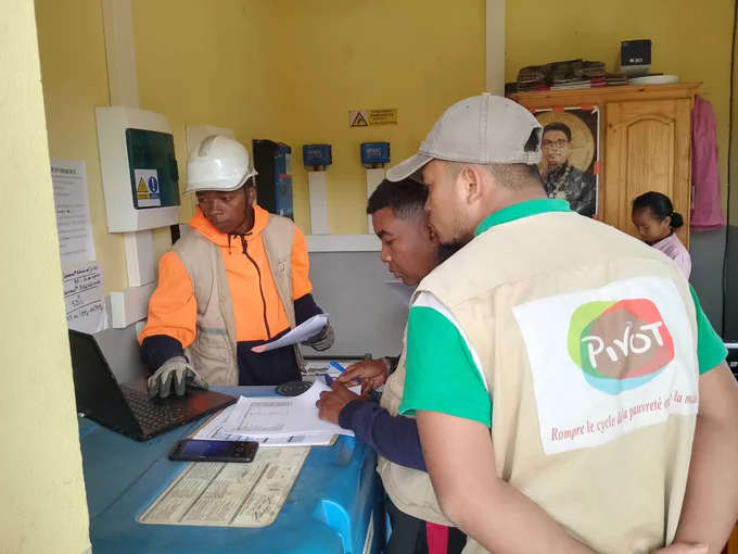 A group of contractors planning the solar panel installation in Analamarina, Madagascar.