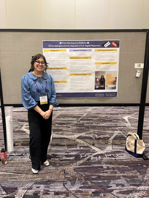 Morgan in front of the poster for the paper “From Red Scare to RedNote: TikTok Refugees and the Rejection of U.S. Digital Hegemony” written by her and Dr. Ramirez