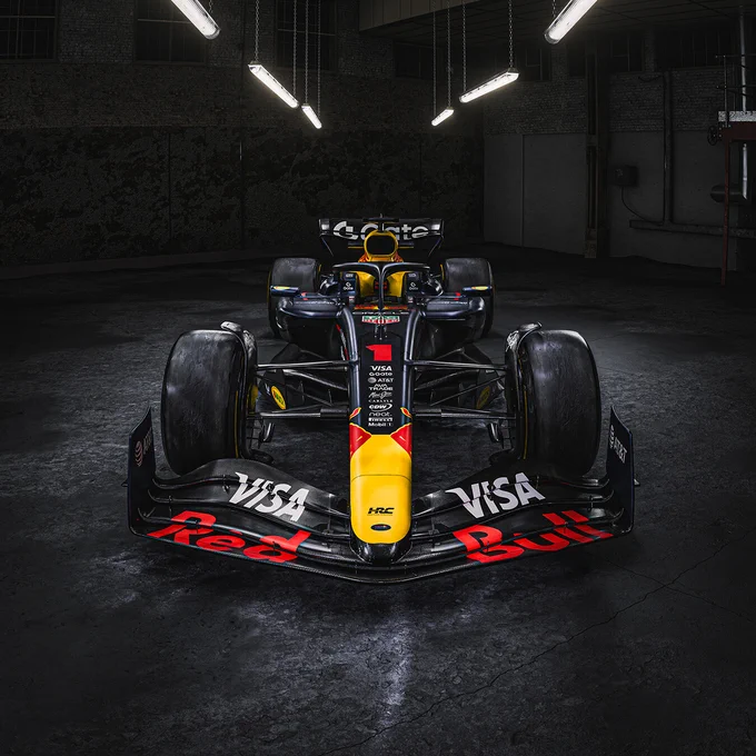 The RB21, shining under hanging ceiling lights, in a warehouse setting.