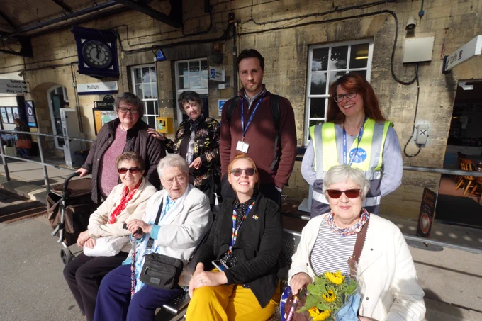 MySight York members, Rob and Danielle from TransPennine Express, and Vicky from MySight York are stood as a group to have their photo taken whilst waiting for the train back to York.