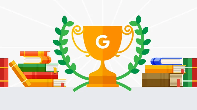 An orange trophy displaying the letter G, framed by a green laurel wreath, with stacks of colorful books on either side.