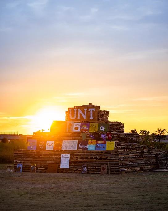 Homecoming Bonfire at sunset.