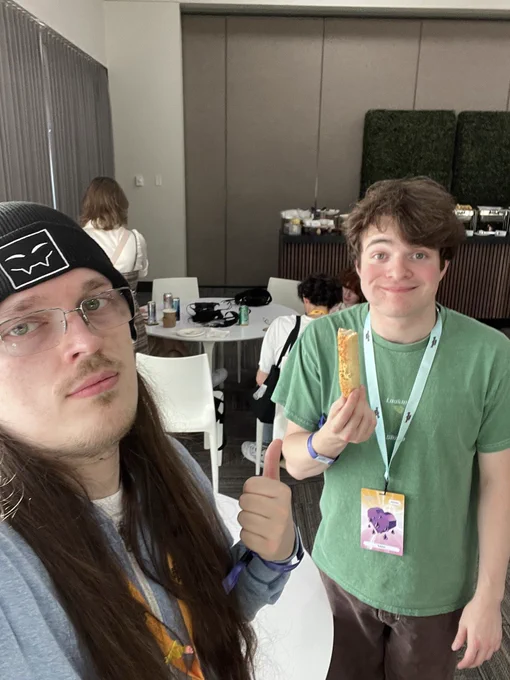 Tubbo holding a slightly bitten breadstick