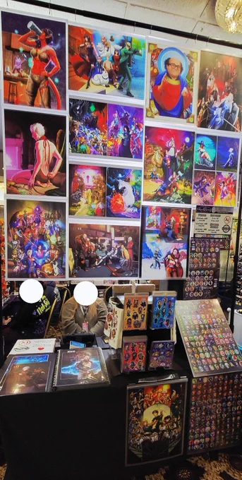 Photo of my artwork setup at my artist alley table.