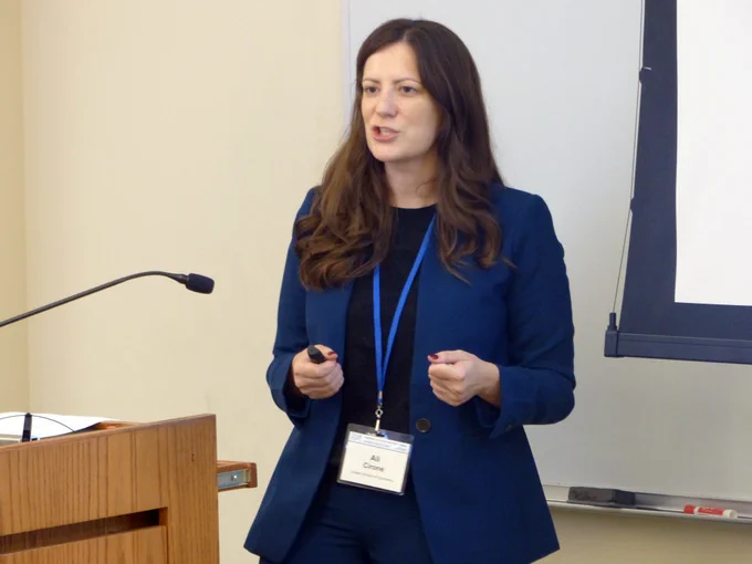 Ali Cirone speaks in a classroom.