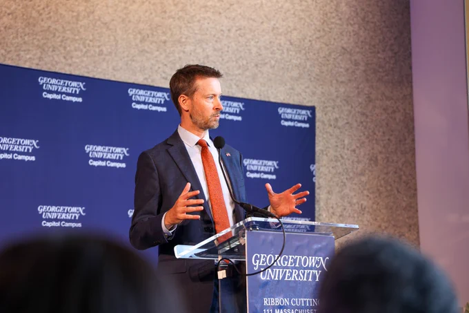 Charles Allen speaking at the ribbon cutting for Georgetown University's new building at 111 Massachusetts Ave NW.
