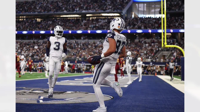 Dallas Cowboys TE #87 Jake Ferguson scores a TD during a Week Seven game against the Washington Commanders 
Photo Credit: Dallas Cowboys