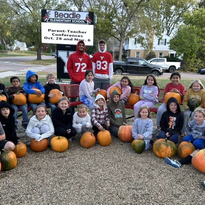 kids with pumpkins