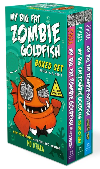 A boxed set for three books in the "My Big Fat Zombie Goldfish" by Mo O'Hara series. The box features a large, orange goldfish with his fins balled up into fists and his huge eyes swirling. The box itself is a teal color while the books are pink, teal, and purple in that order.