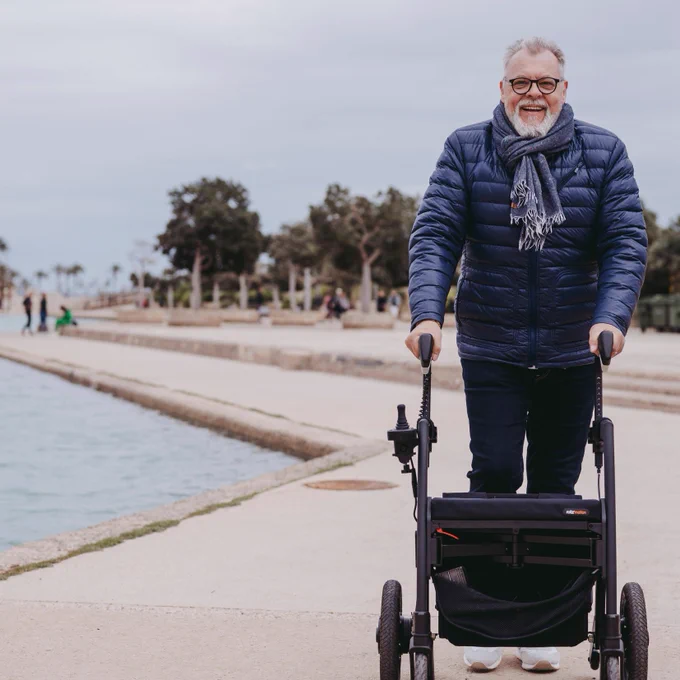 A man using a rollator