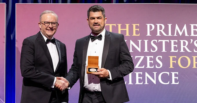 Matt Dodds receiving his prize from the Hon Anthony Albanese MP, Prime Minister of Australia