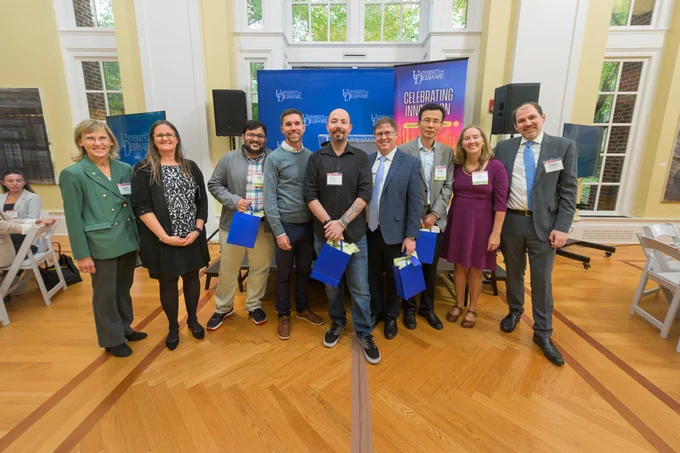 Miguel Garcia-Diaz, UD vice president for research, scholarship and innovation (right), named five new Innovation Ambassadors to serve as mentors and champions for research translation and innovation across campus. Pictured left to right: Laura Carlson, UD interim president; Amy Slocum, Delaware EPSCoR director; Innovation Ambassadors Sagar Doshi, Christoper Martens, Matthew Mauriello, Daniel Stevens and Zhihao Zhuang; Jill Higginson, lead PI for the NSF ART program at UD, and Miguel Garcia-Diaz.