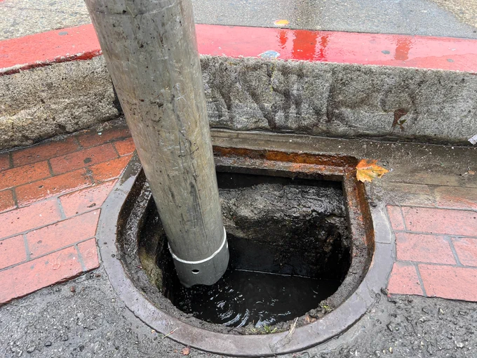 Clearing out a storm drain with the Vac-Con truck.