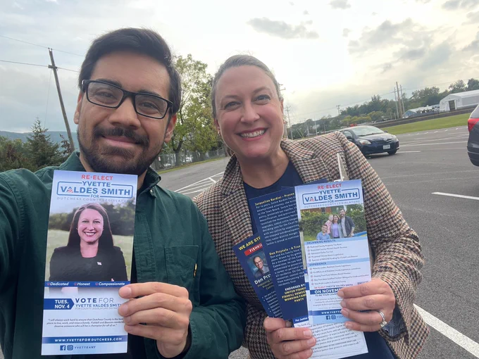 Canvassing photo with Dutchess County Legislator and Minority Leader Yvette Valdés Smith. We’re outside in Fishkill. We’re holding palm cards.